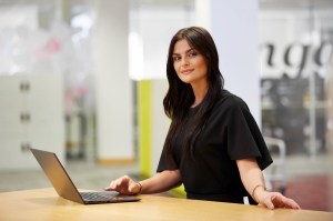 Judith Alexander_IRE_2016_MB_08.jpgWoman wearing black standing at a counter using a laptop, PC or computer